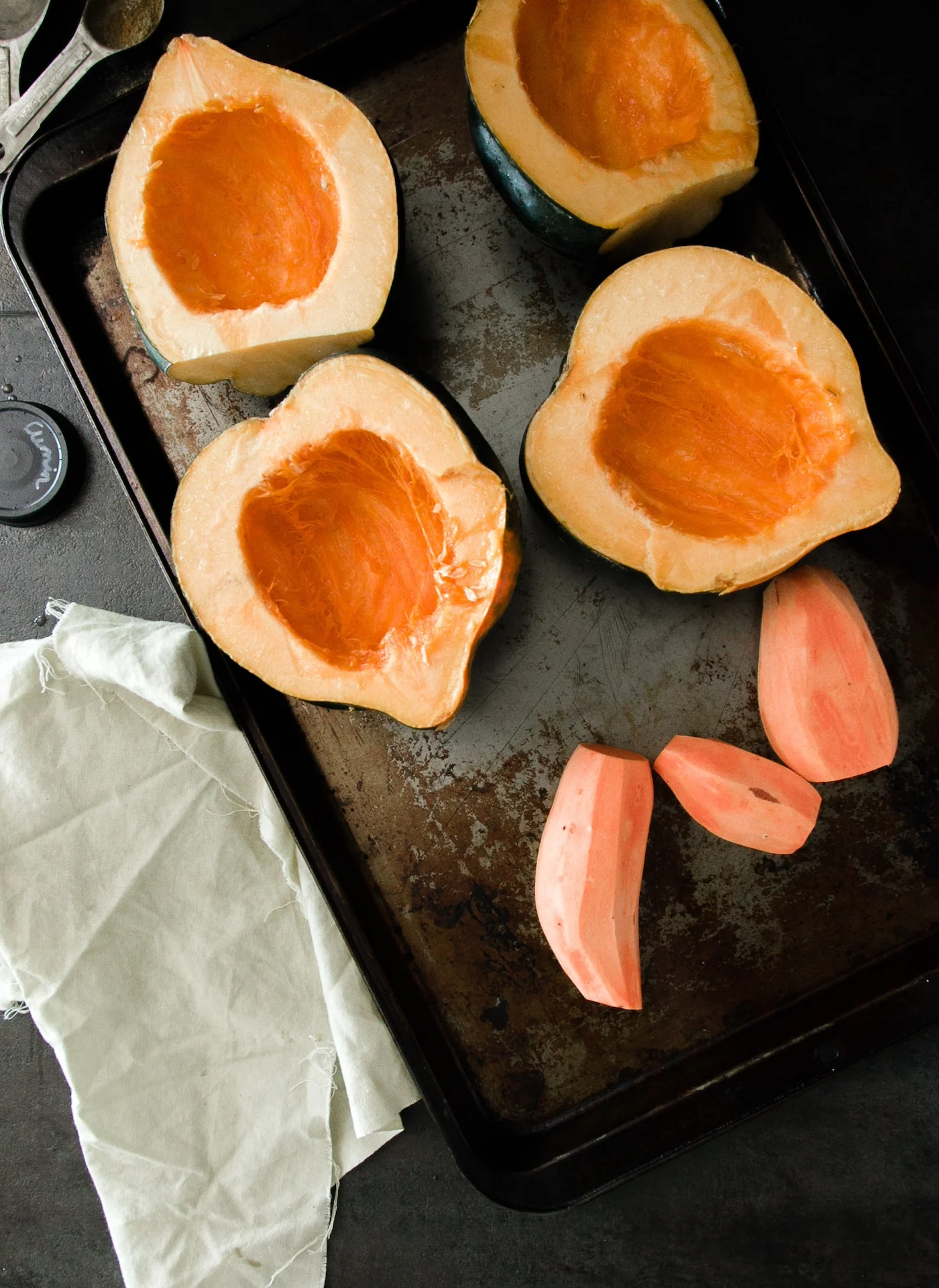 Roast Squash and Sweet Potatoes on a baking sheet