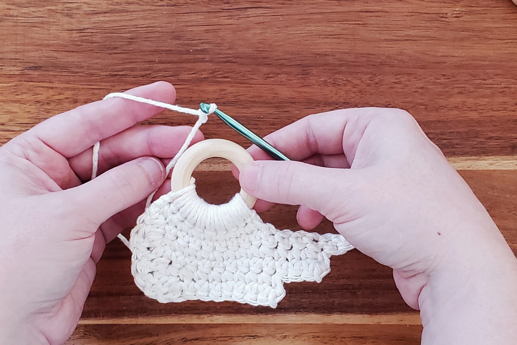 Turn ring over and repeat steps for second wing of your crochet angel ornament