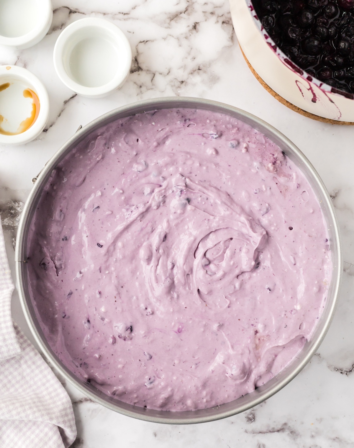 blueberry cheesecake filling in a springform pan