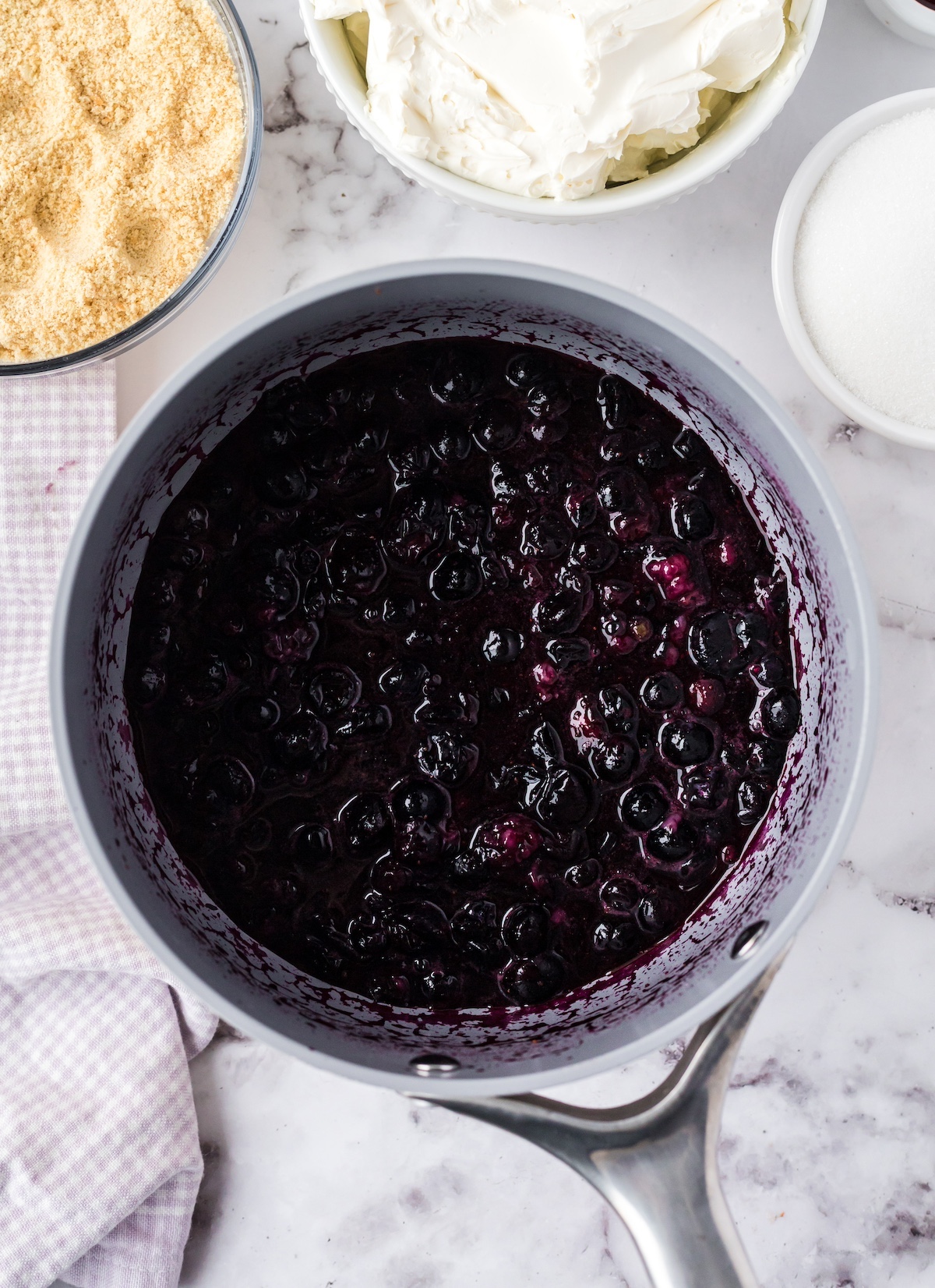 cooked blueberry puree in a saucepan