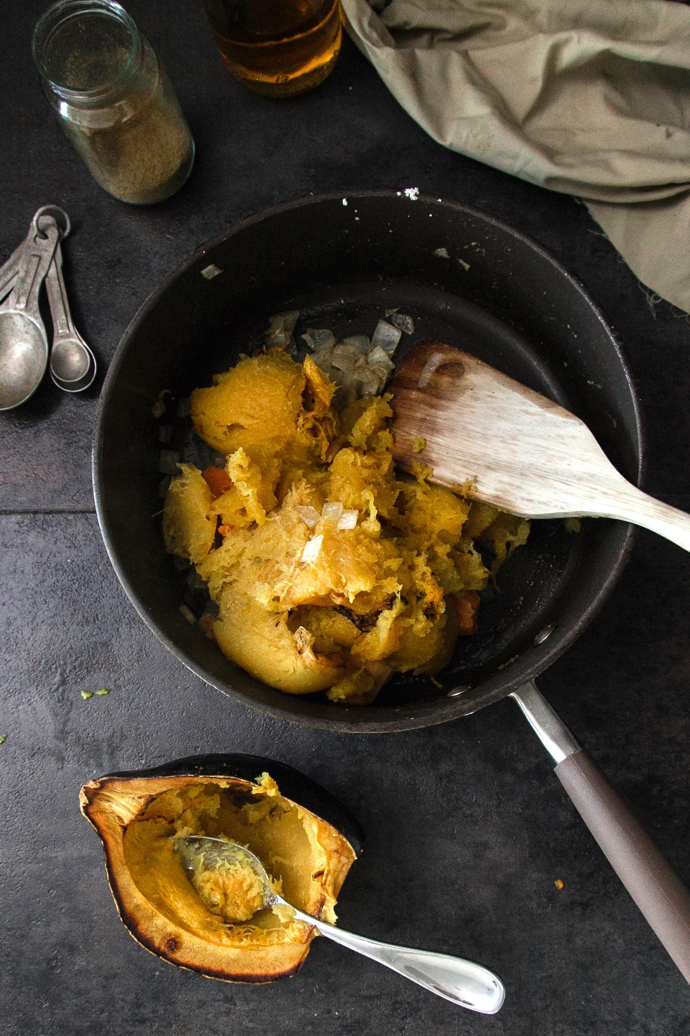 place the acorn squash and sweet potatoes in a saucepan