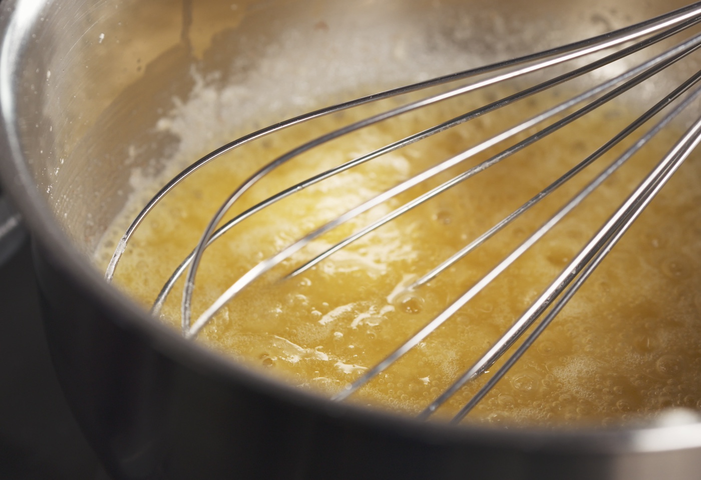 Boiling-sugar-evaporated-milk-and-butter-on-the-stove