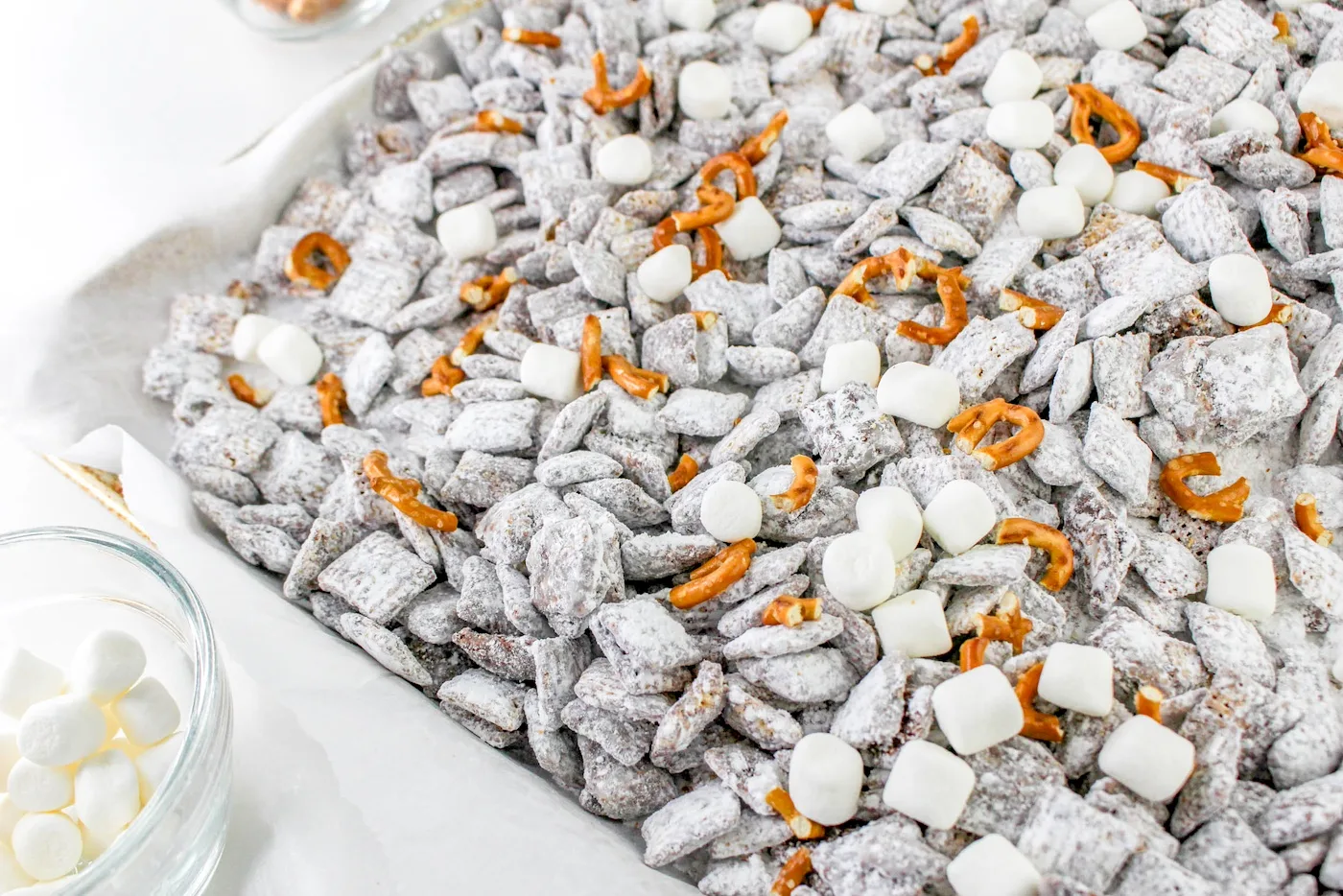 Coated cereal spread onto a baking sheet