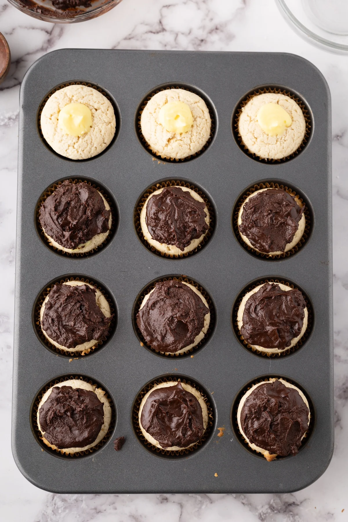 Cupcakes topped with chocolate ganache