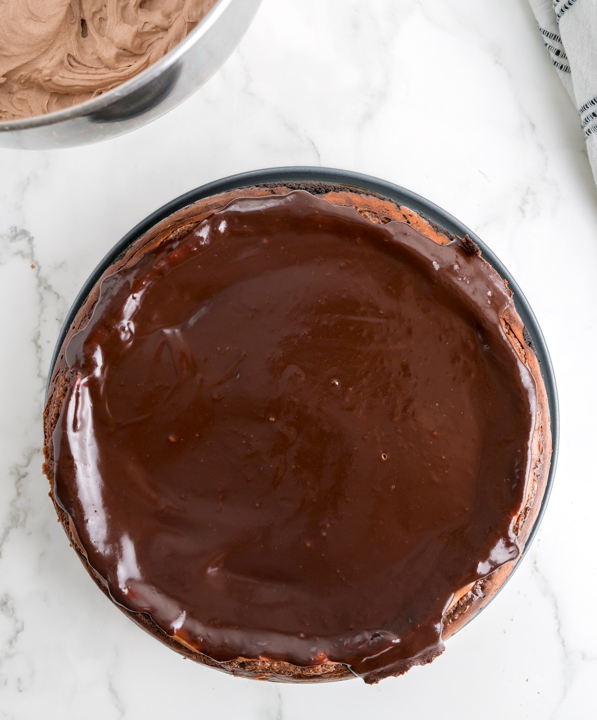 top the cake with the chocolate ganache