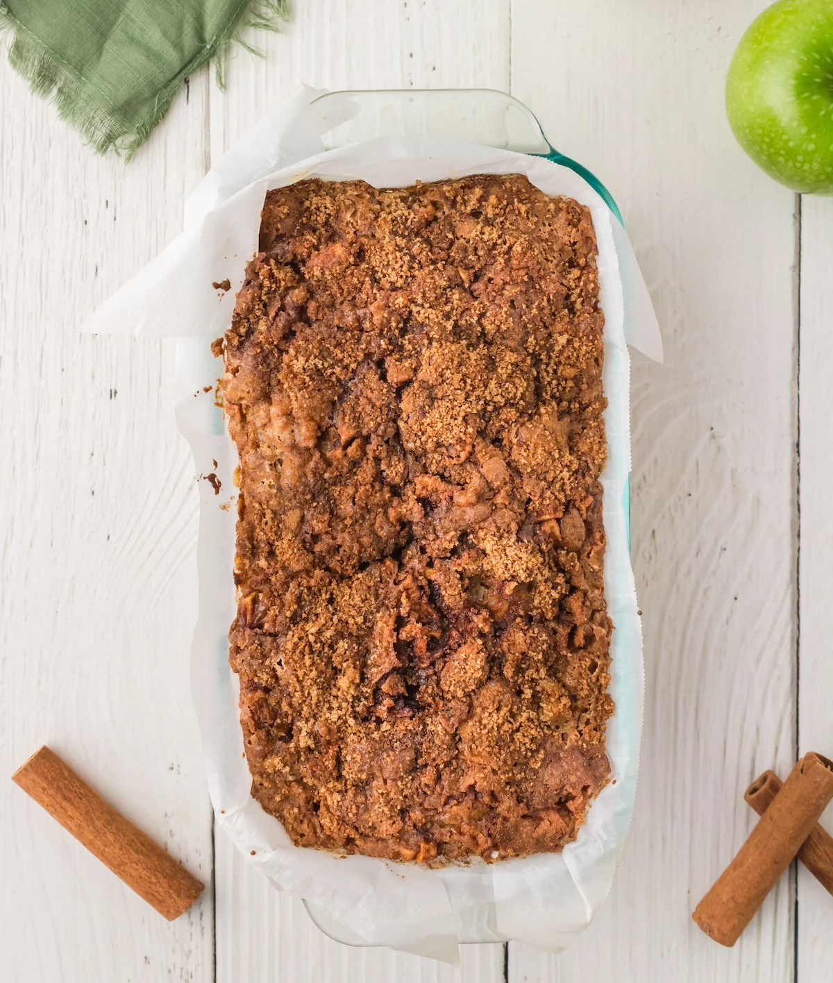 Baked apple bread recipe in a pan cooling