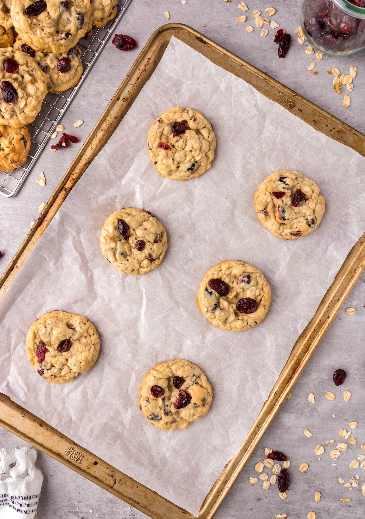 Baked oatmeal cranberry cookies ona cookie sheet