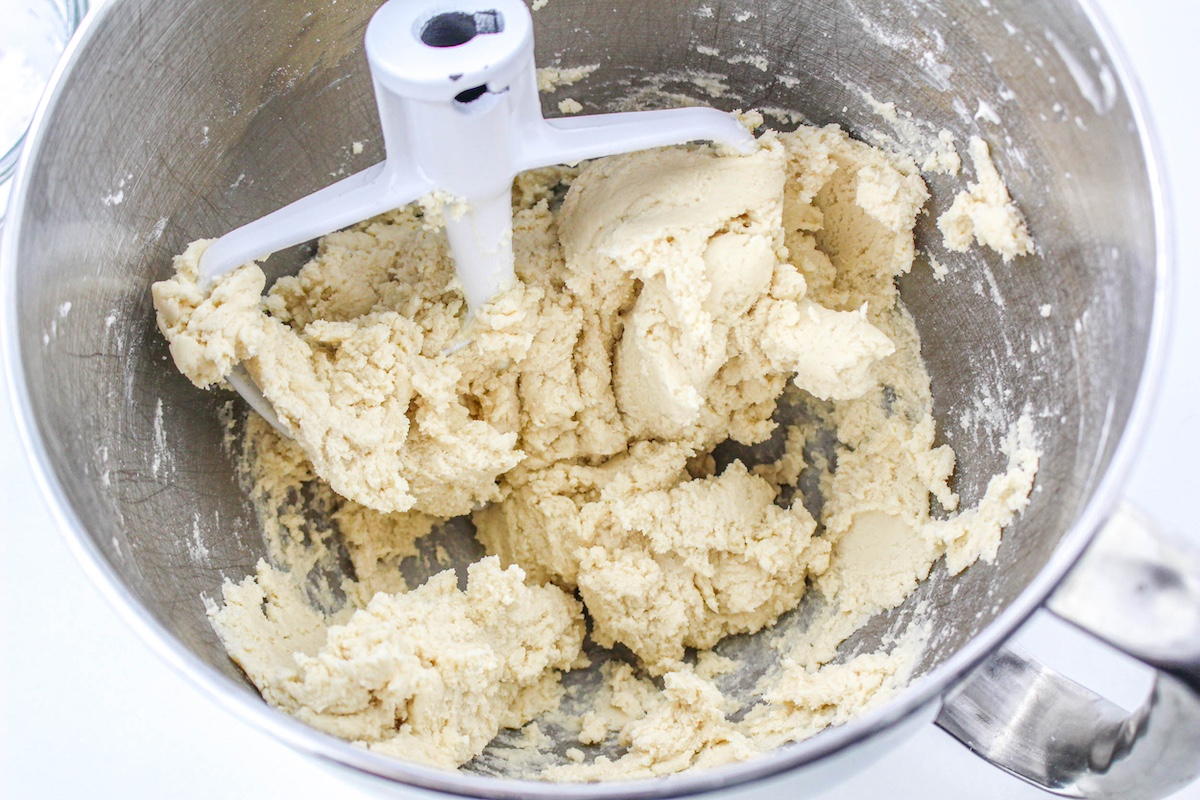 Flour and salt mixture added to the creamed butter and powdered sugar