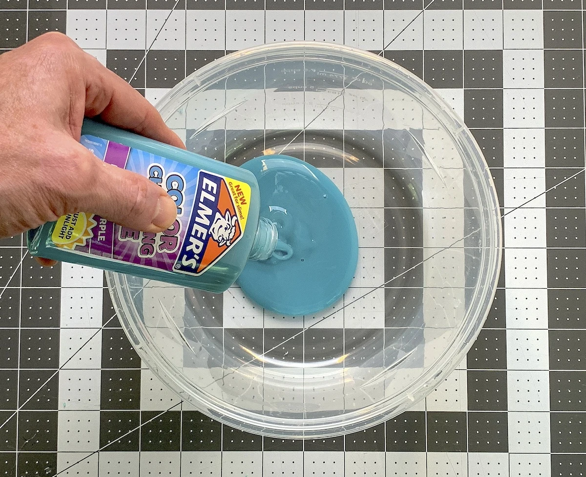 Add the color changing glue to the bowl