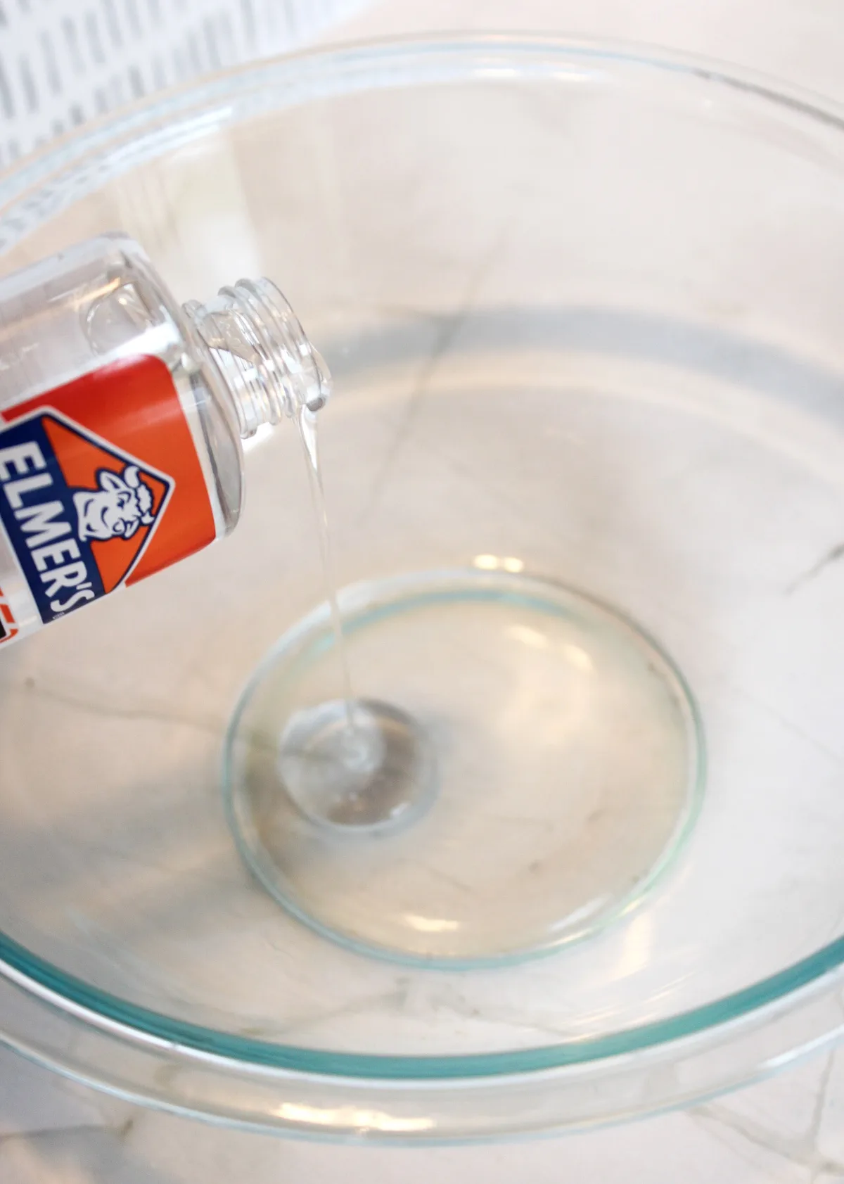 Adding clear glue to a glass bowl