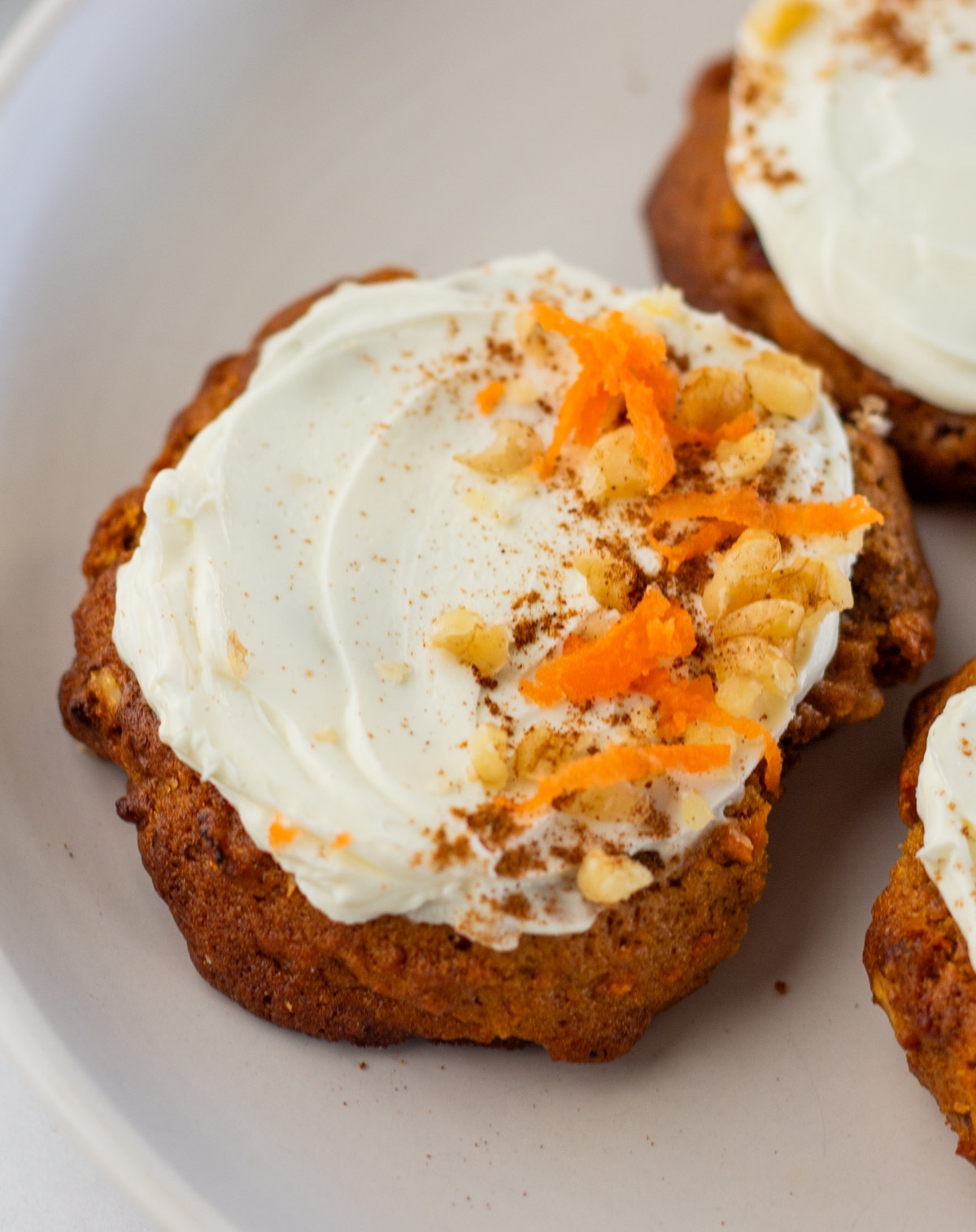 Cookies topped with carrots and nuts