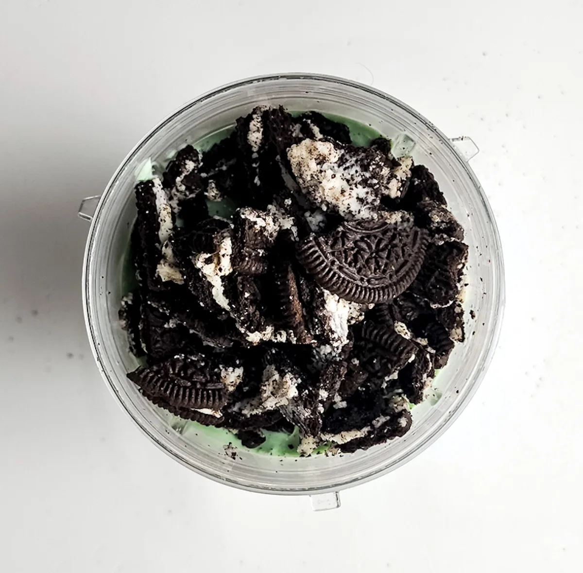 Crushed oreo added to the glass