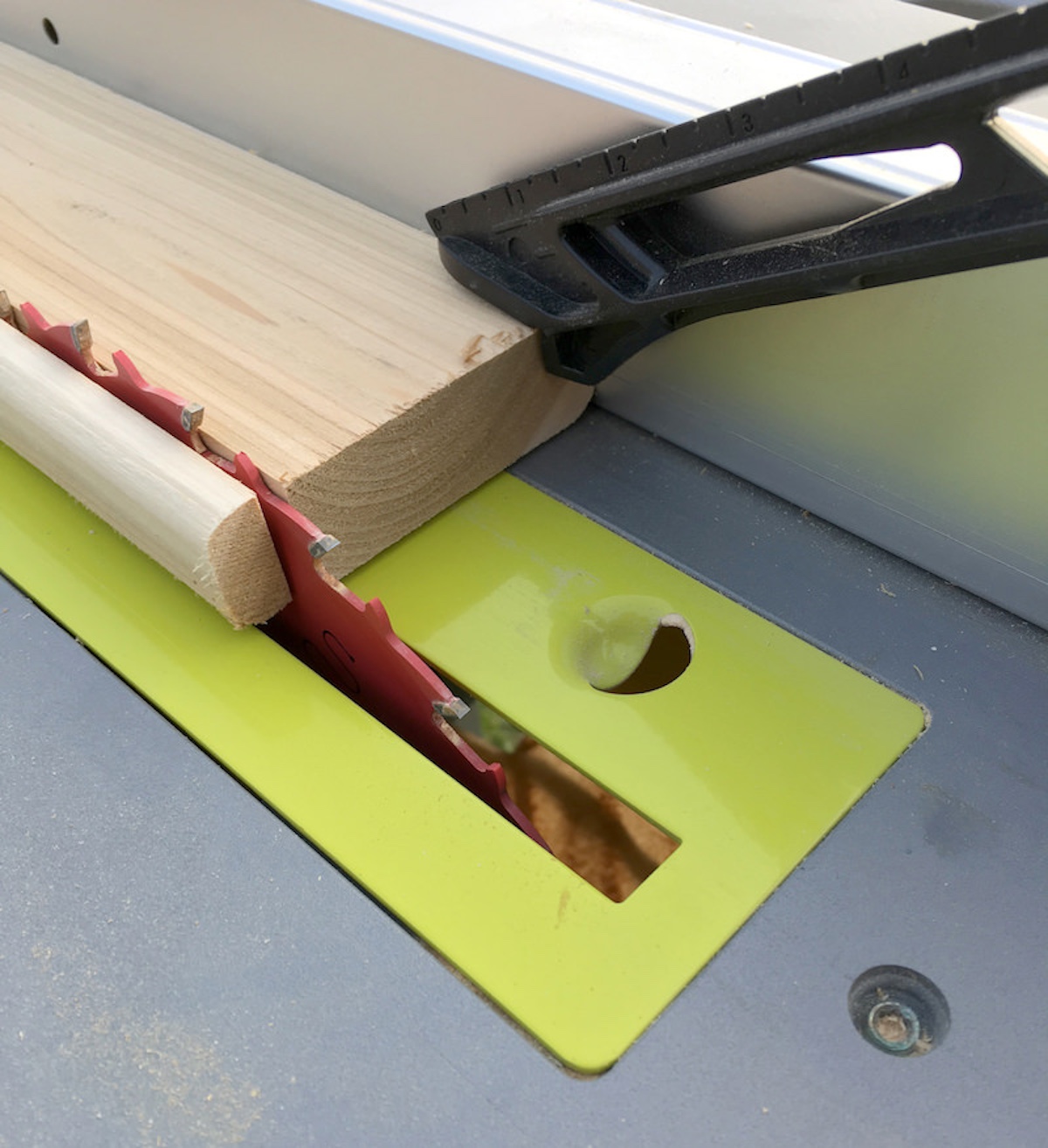 Cut one edge off a cedar plank with a table saw