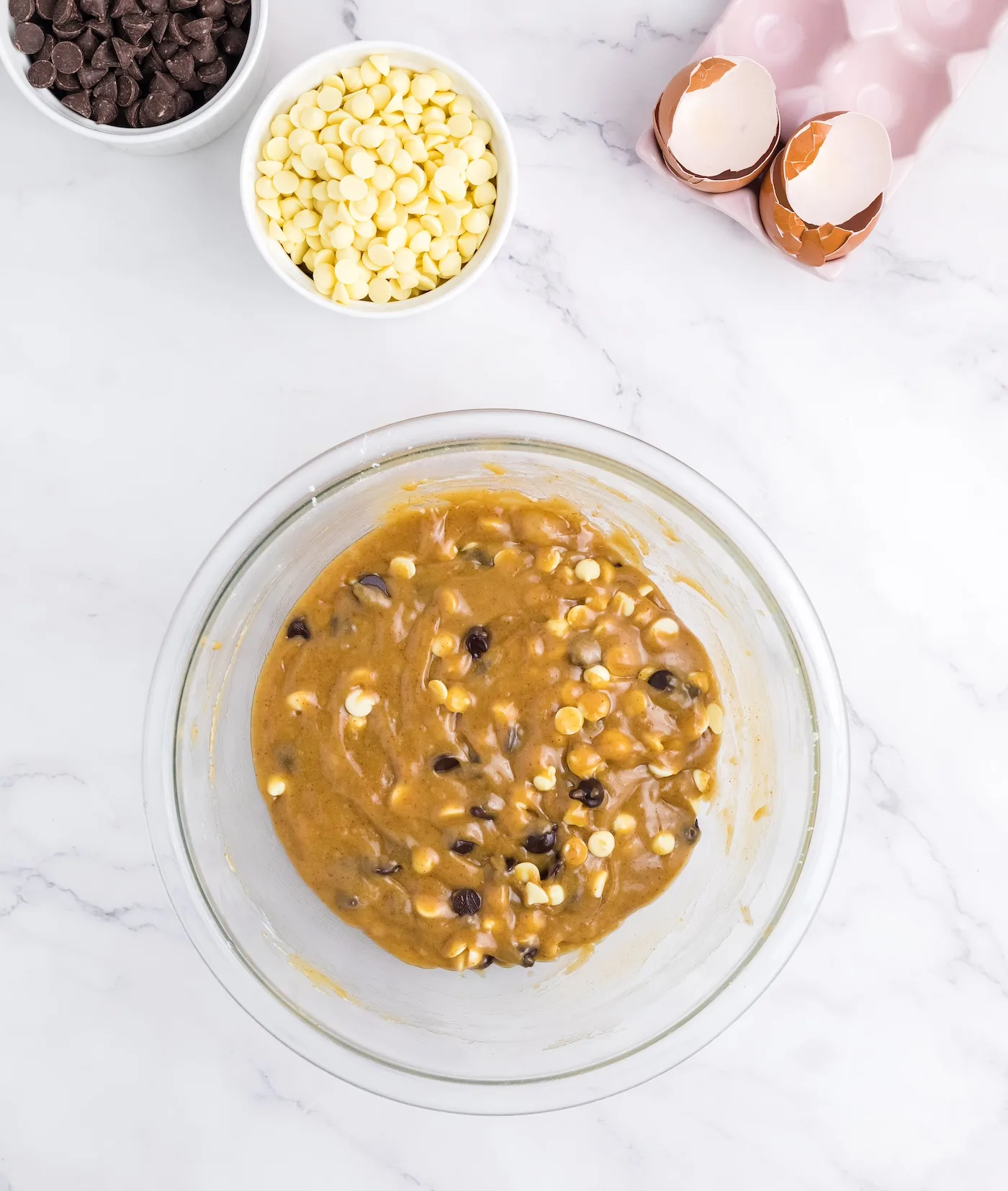 Folding the chocolate chips into the brown butter batter