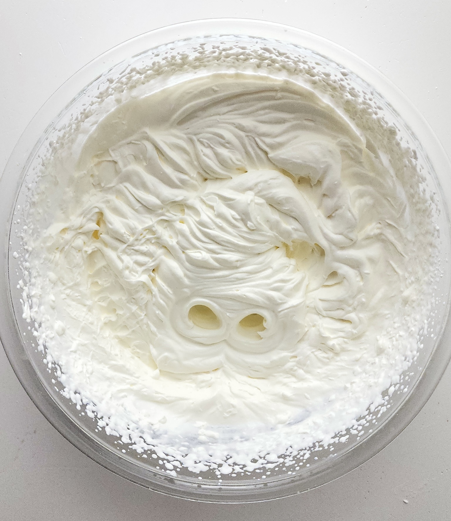 Heavy cream whipped until stiff peaks have formed