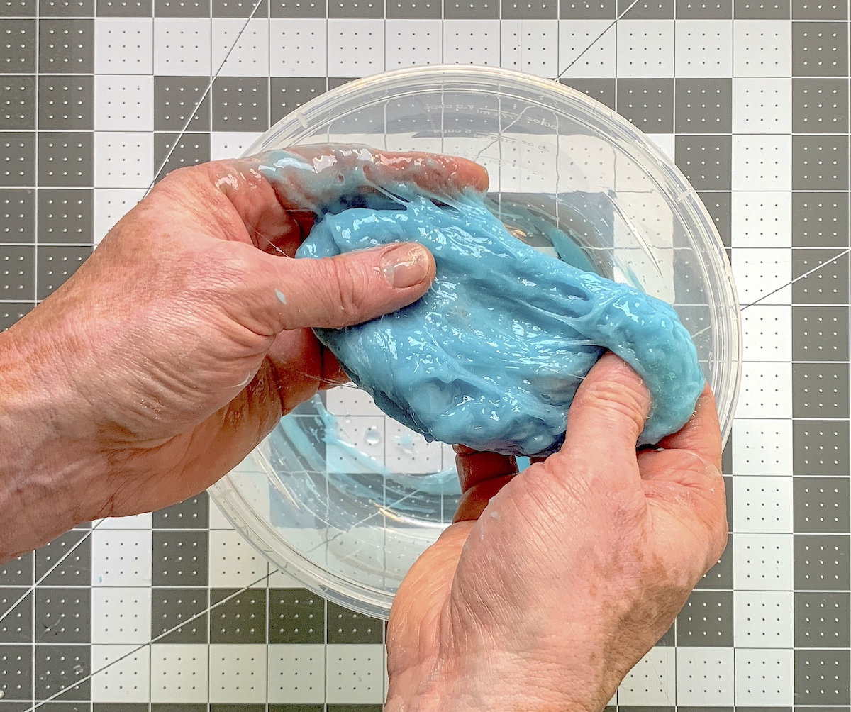 Kneading the colour changing slime with hands
