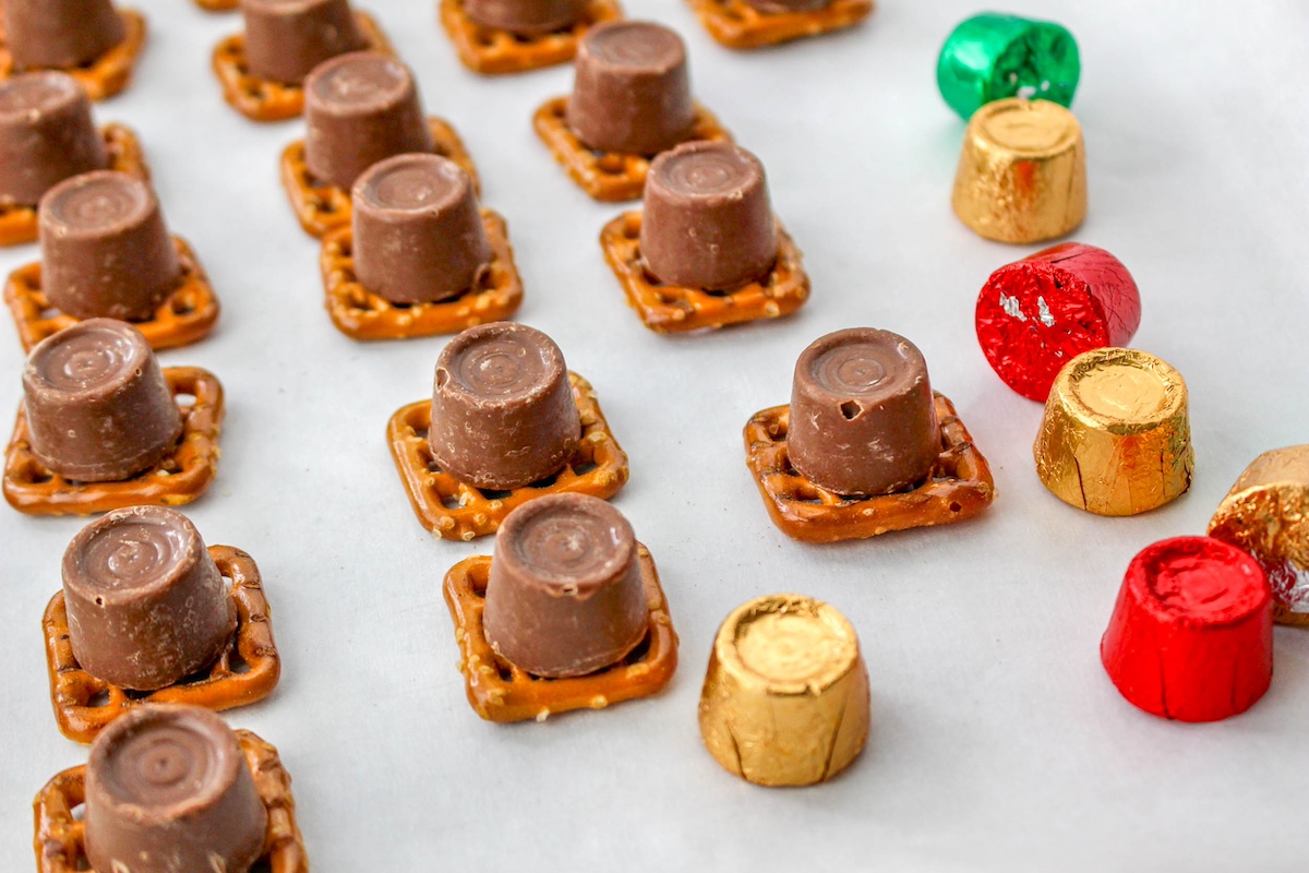 Rolos on top of square pretzels