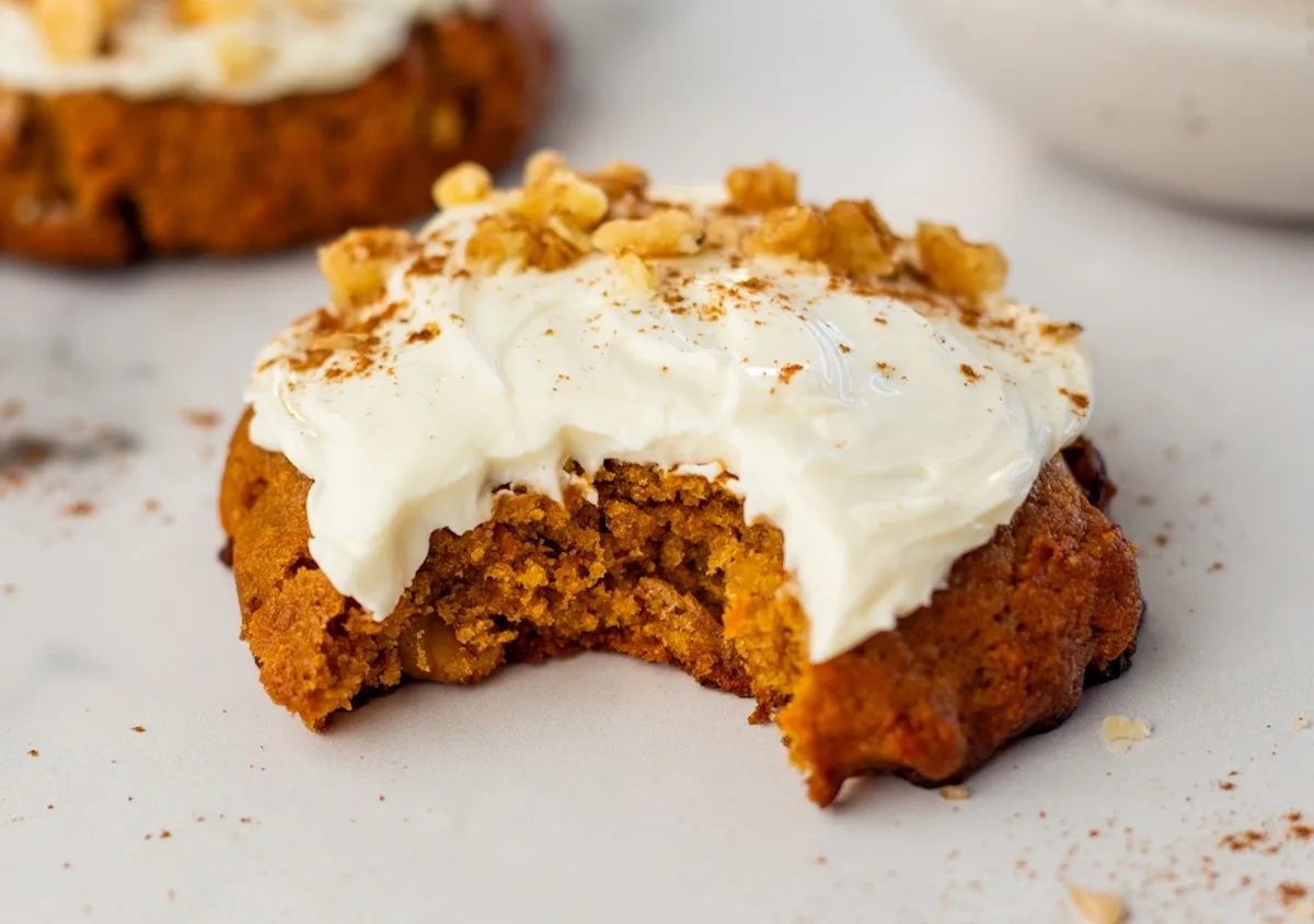 carrot cake cookie with a bite taken out of it