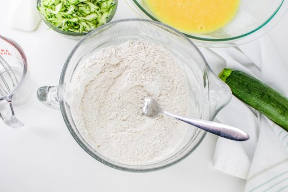 flour, sugar, salt, baking soda, cinnamon, and baking powder mixed together in a bowl