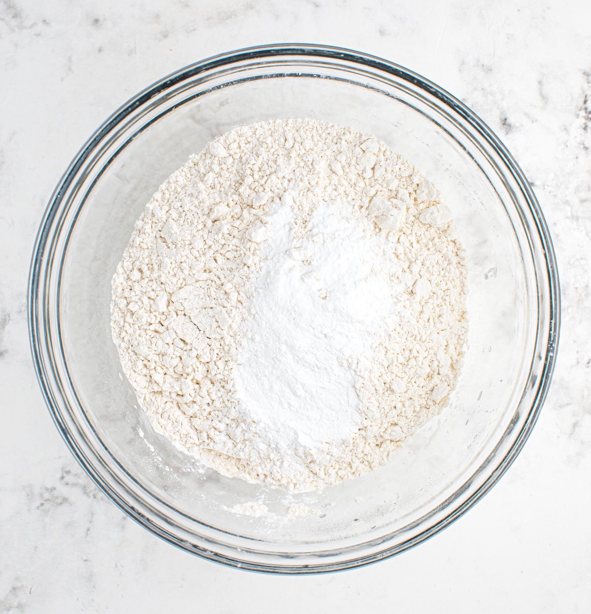 mix flour, baking powder, baking soda, and salt until combined