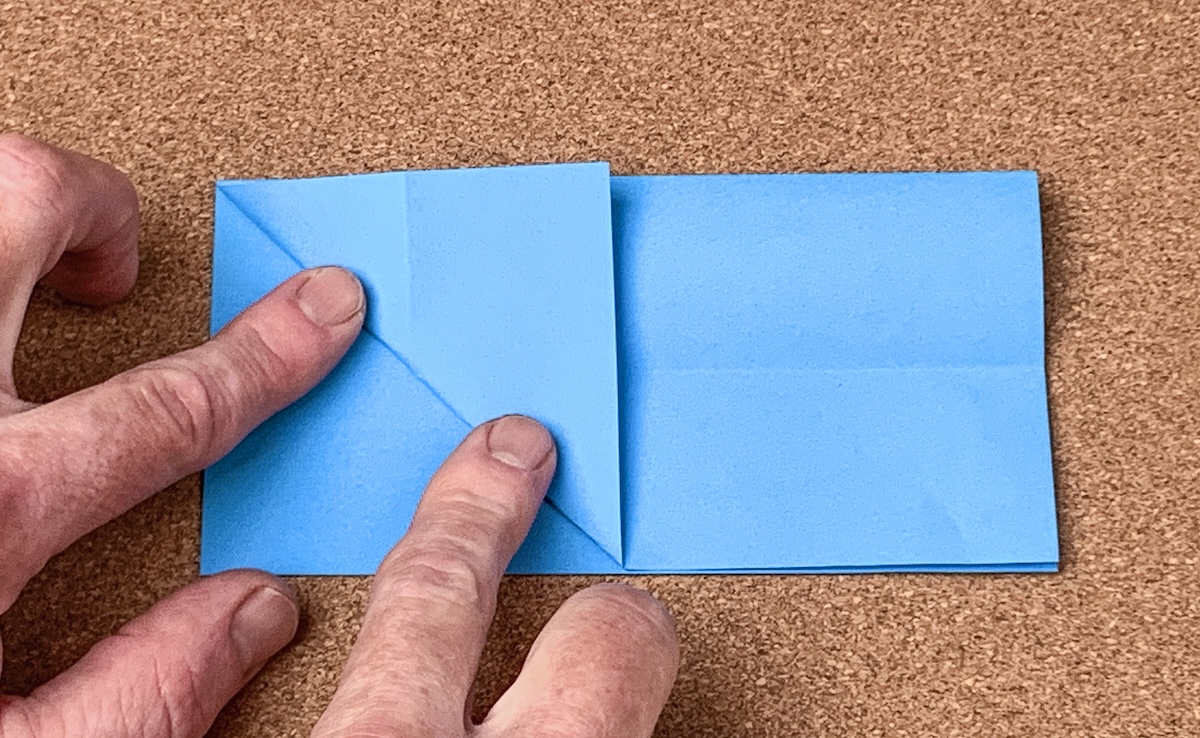Fold-the-bottom-left-corner-to-the-top-folded-edge