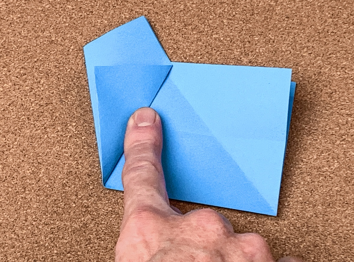Fold-the-top-layer-of-the-bottom-right-hand-corner-up-and-even
