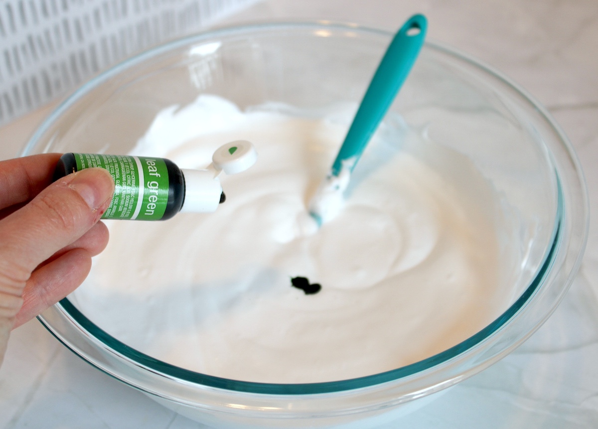 Add green food coloring to the mixture