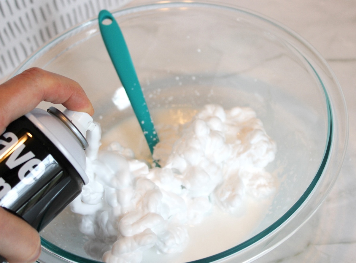 Foam shaving cream added to the baking soda and glue mixture