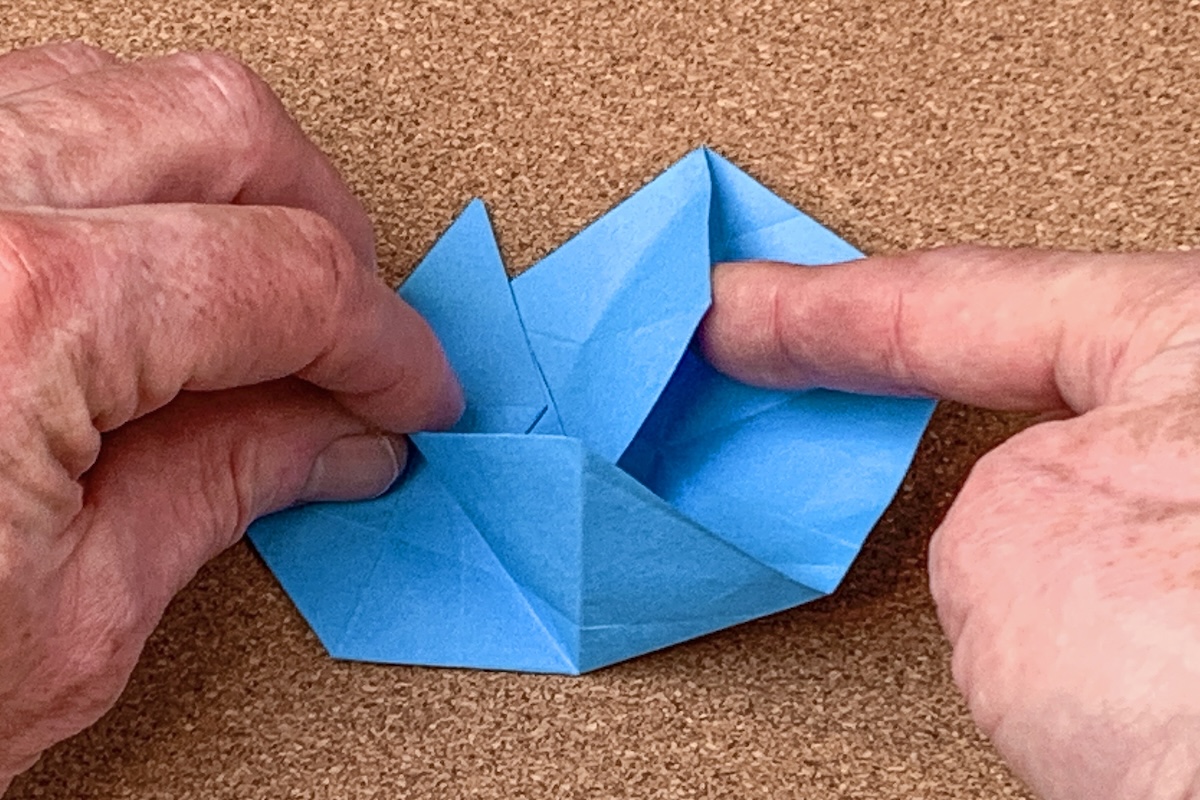 start-folding-each-side-as-outlined-from-step-15