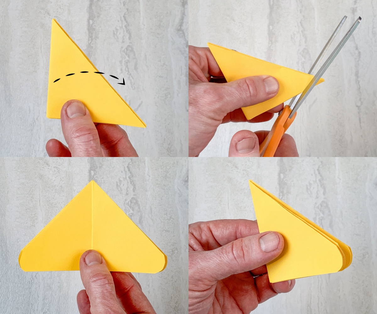 Fold triangle in half and trim with scissors to round the wings