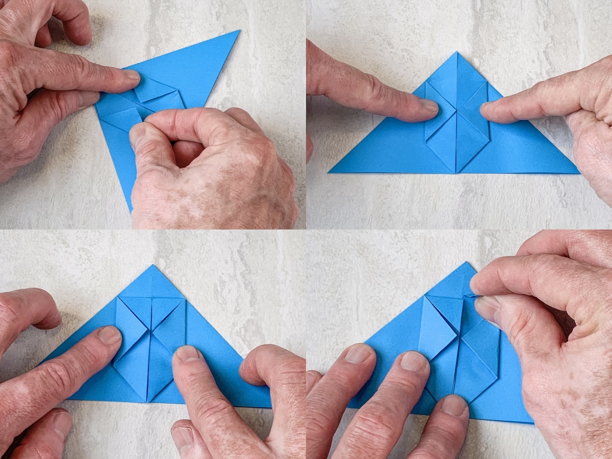 fold in the side flaps and then fold both tabs down
