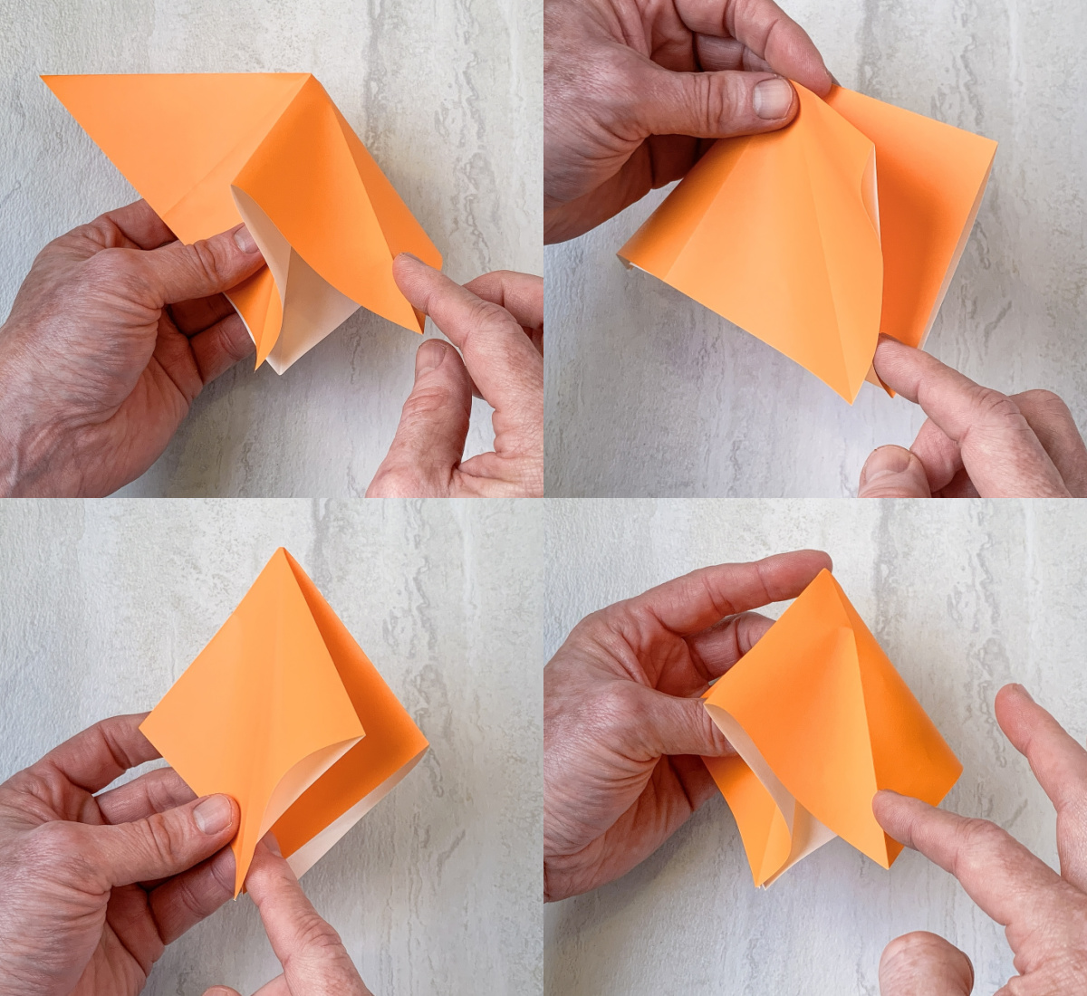 Fold both sides of the orange paper to form a square