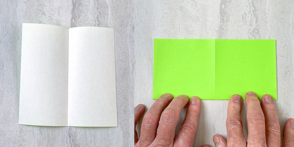 Open piece of paper folded into a rectangle to expose the green side