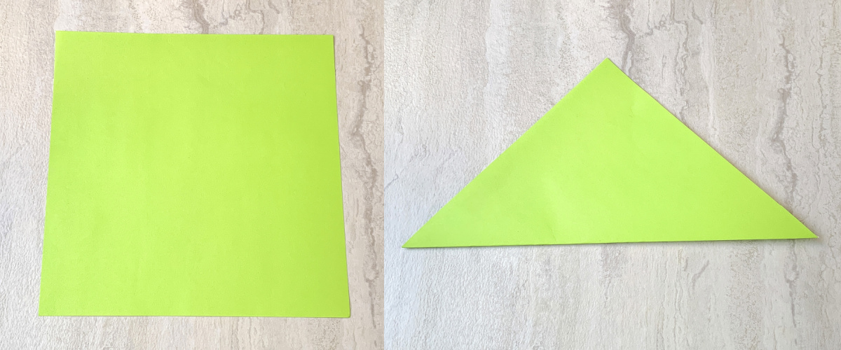 fold the green paper in half to make a triangle