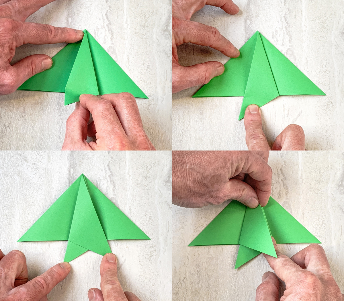 fold the right flap over to the left and the left flap over to the right to create the tail