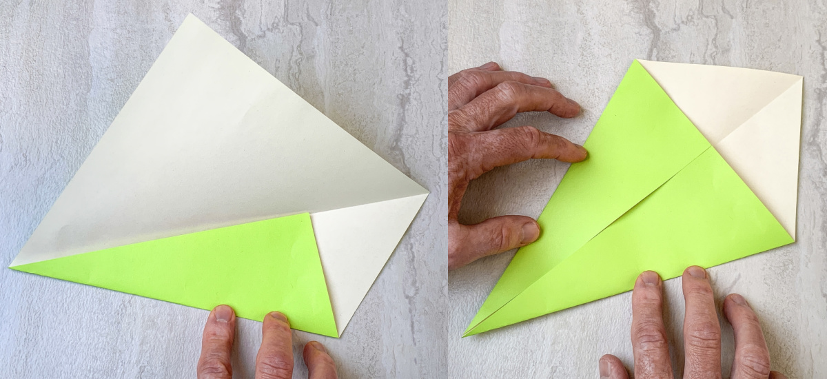 fold the side points of paper in toward the center and smooth