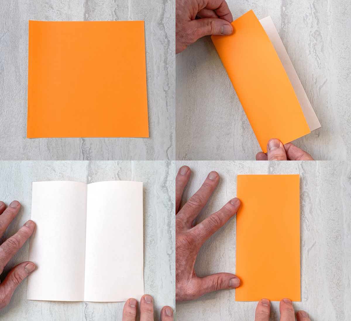 orange origami paper folded in half and then opened back up again
