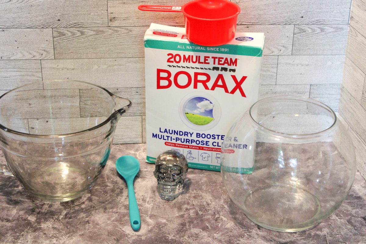 borax, glass skull, measuring cup, glass bowl