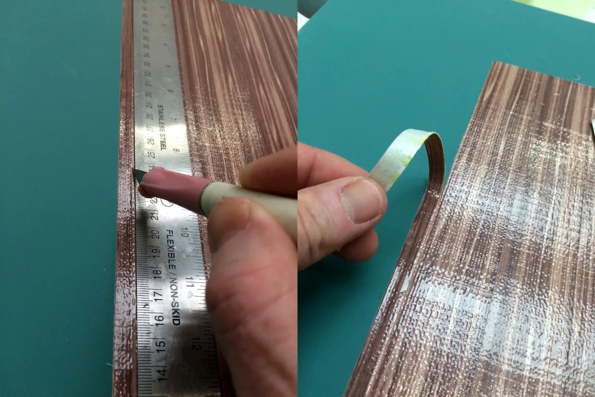 Cutting the edges off the duck tape with a craft knife