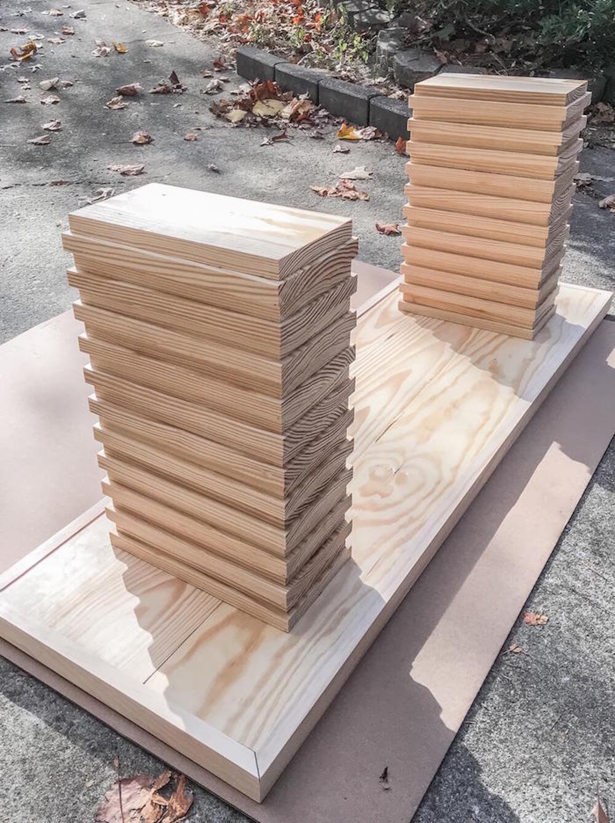 Stacked wood bench legs glued together onto the bench top