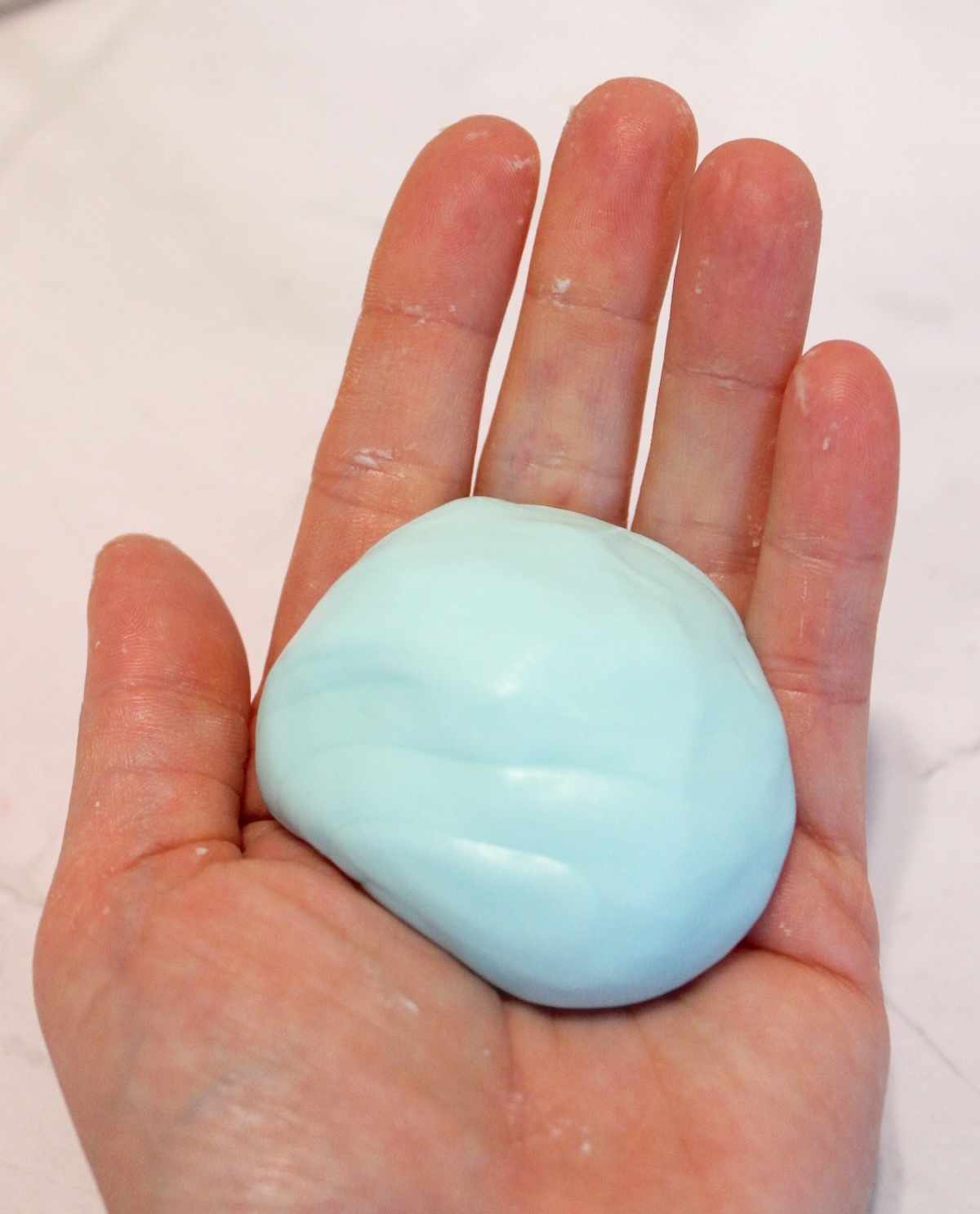 diy putty in a woman's hand