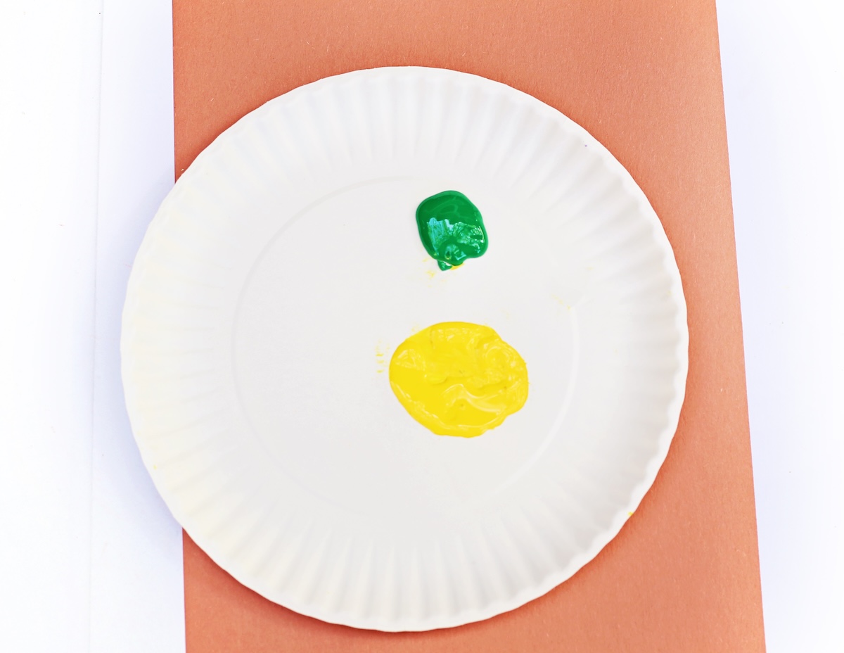paint sitting on a paper plate