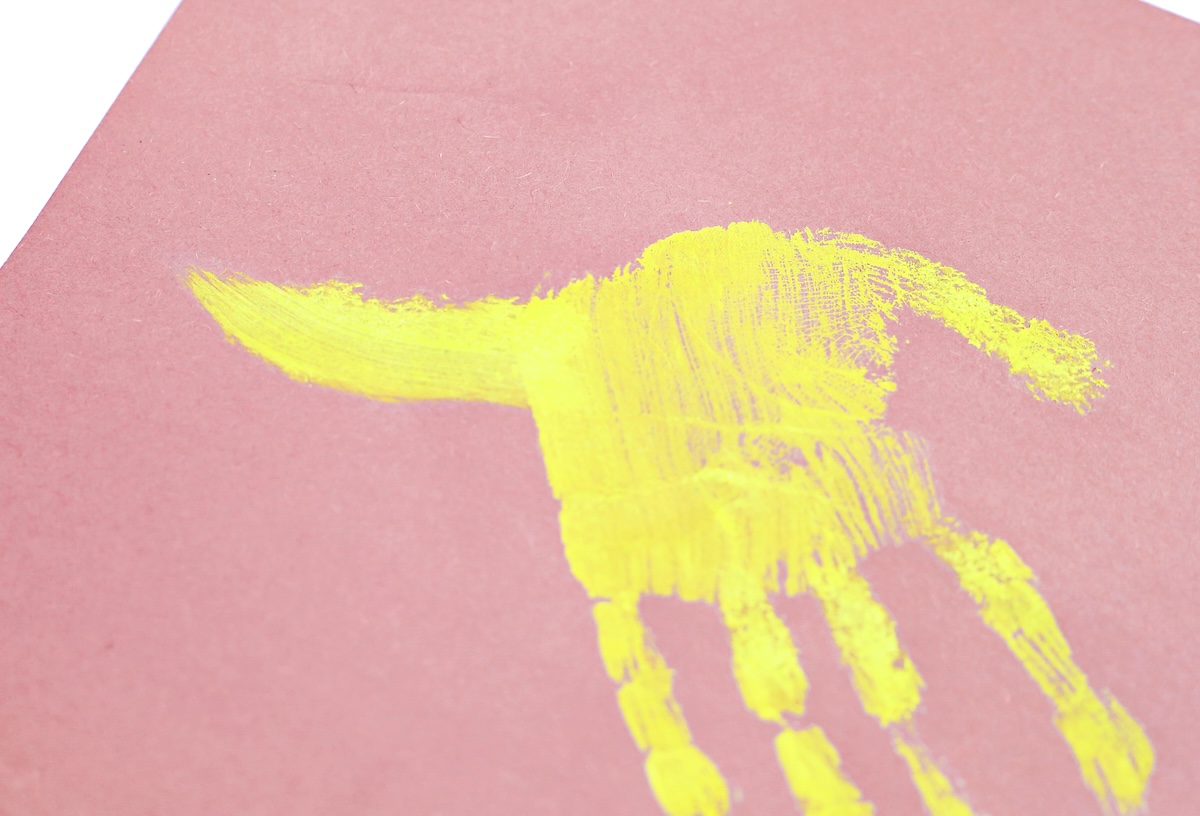 adding a tail to the handprint