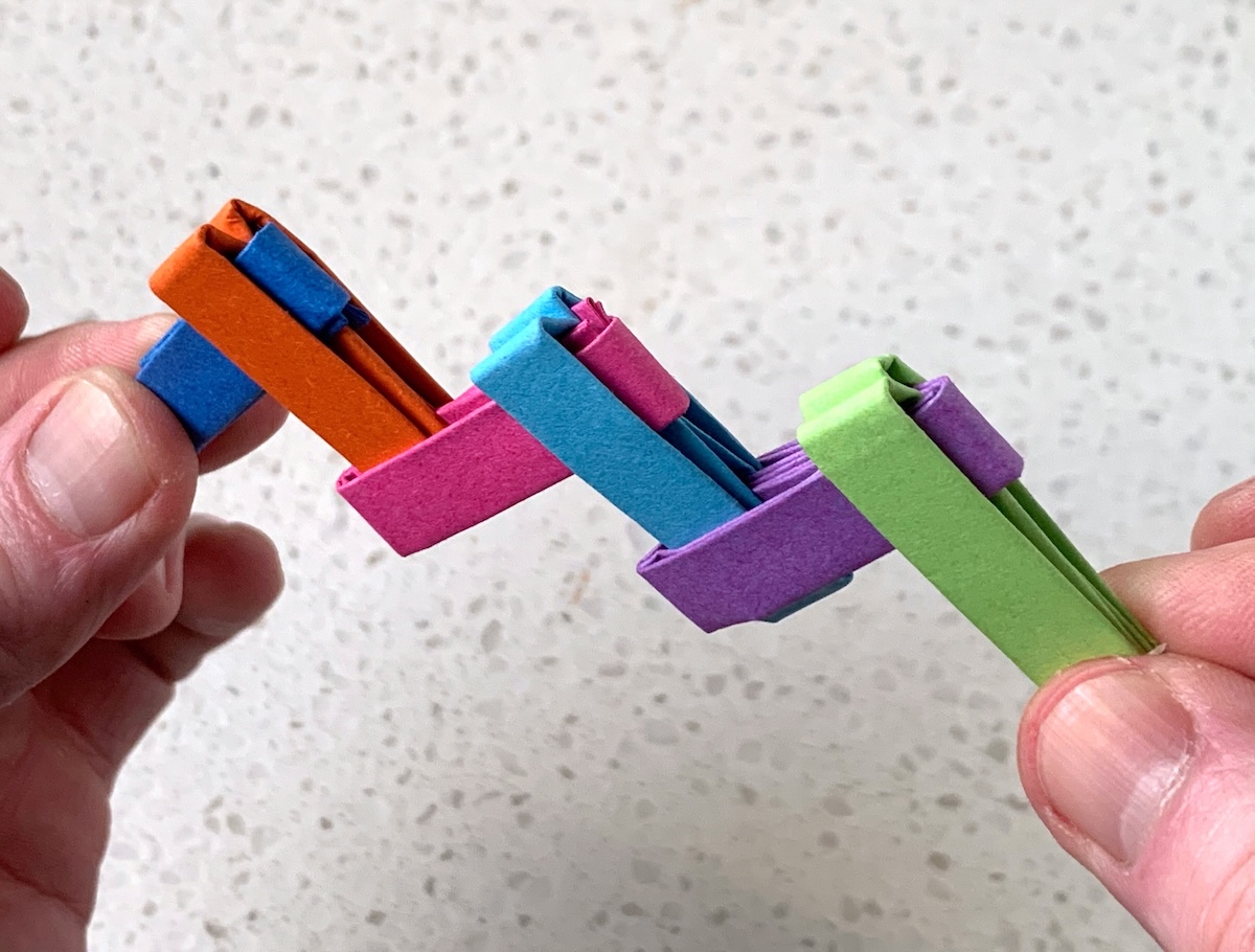 attaching the paper Vs together