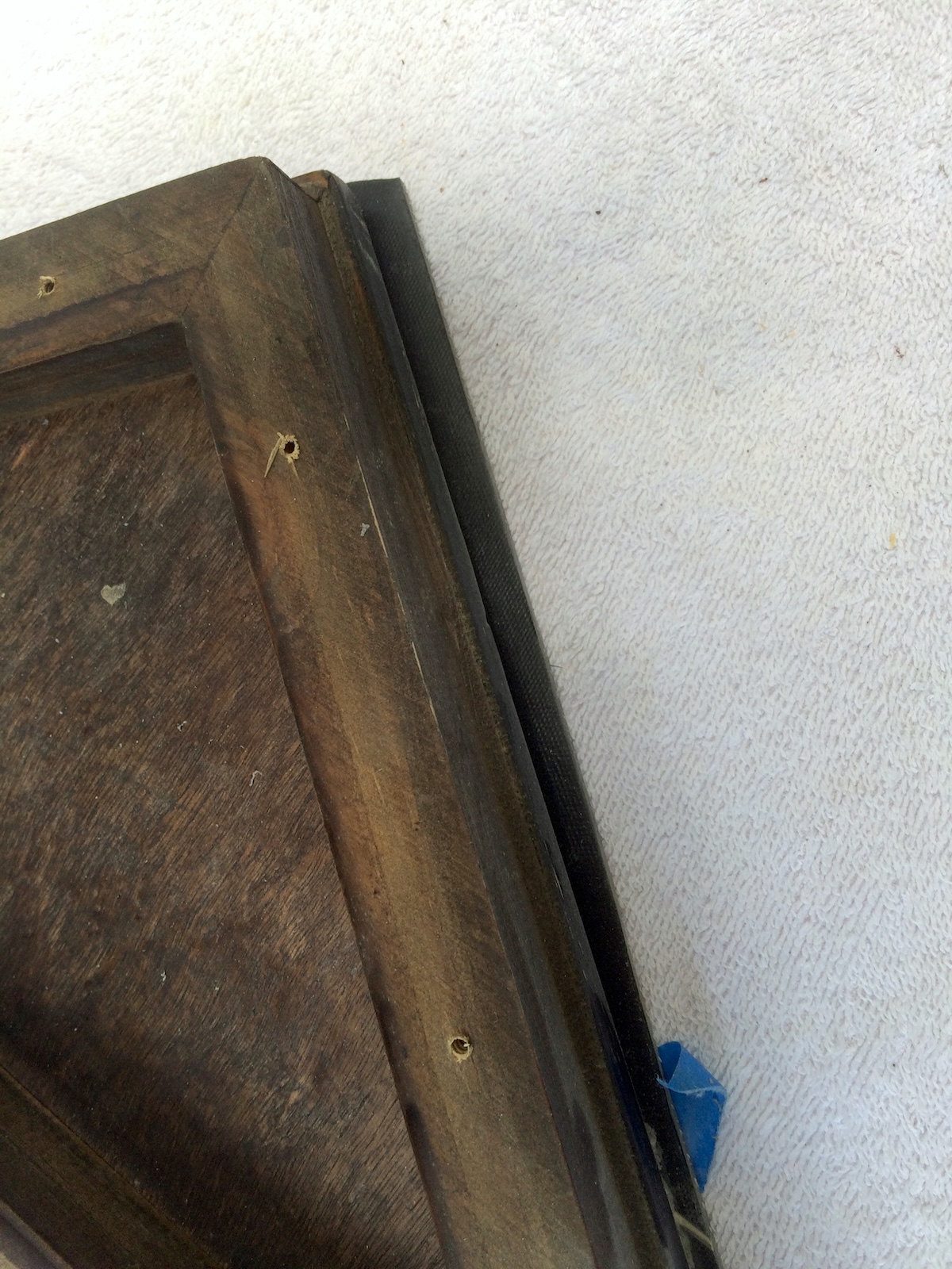 edge of the table after cutting off excess flooring