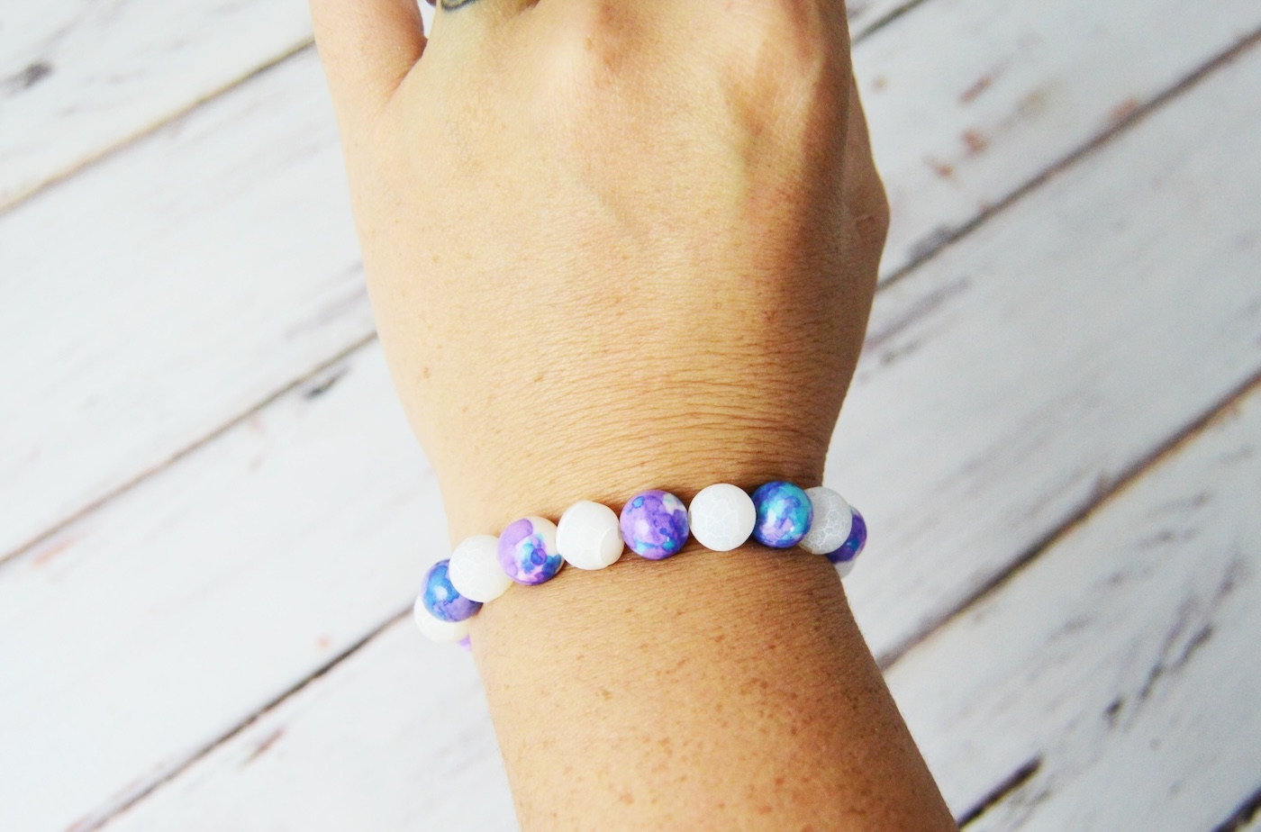 stretch beaded bracelet on a woman's wrist