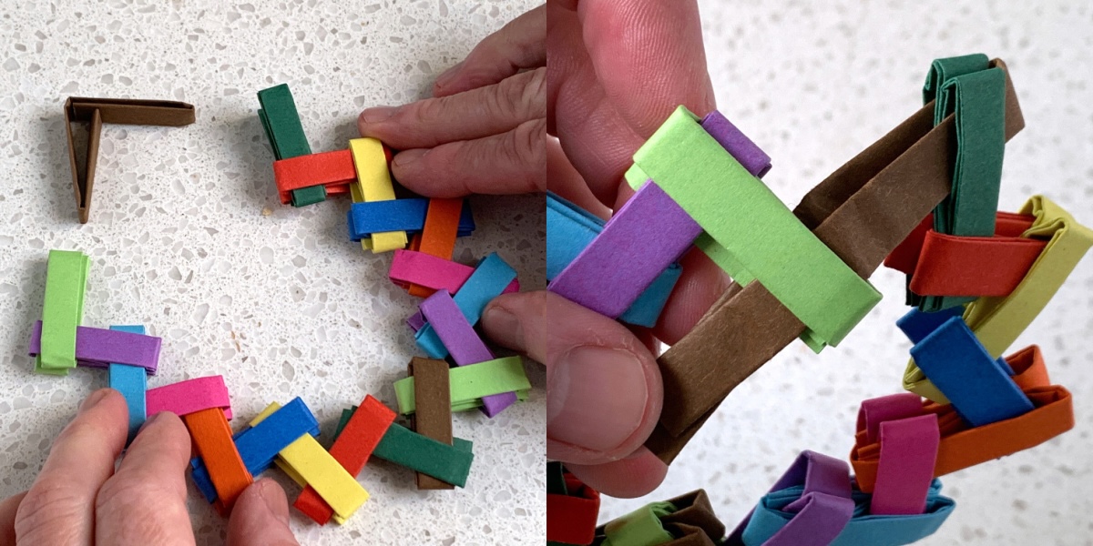 unfold the last piece and slide the flaps into the other end