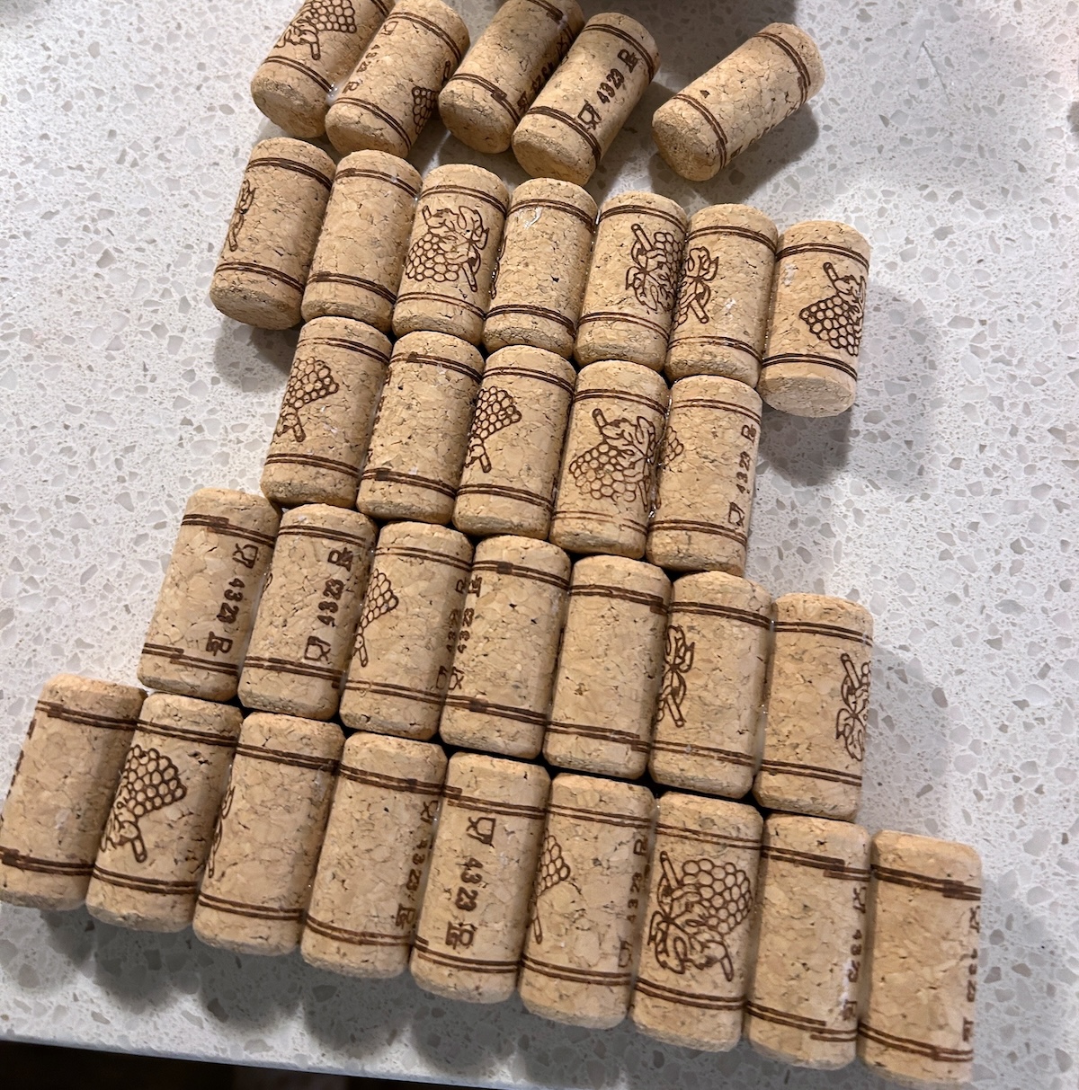 corks laid out flat on a work surface