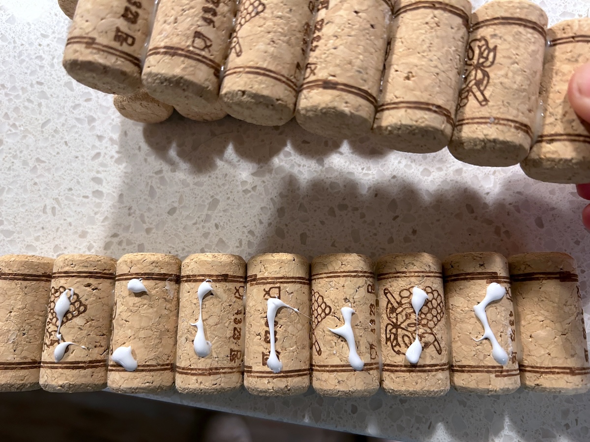 gluing corks into rows